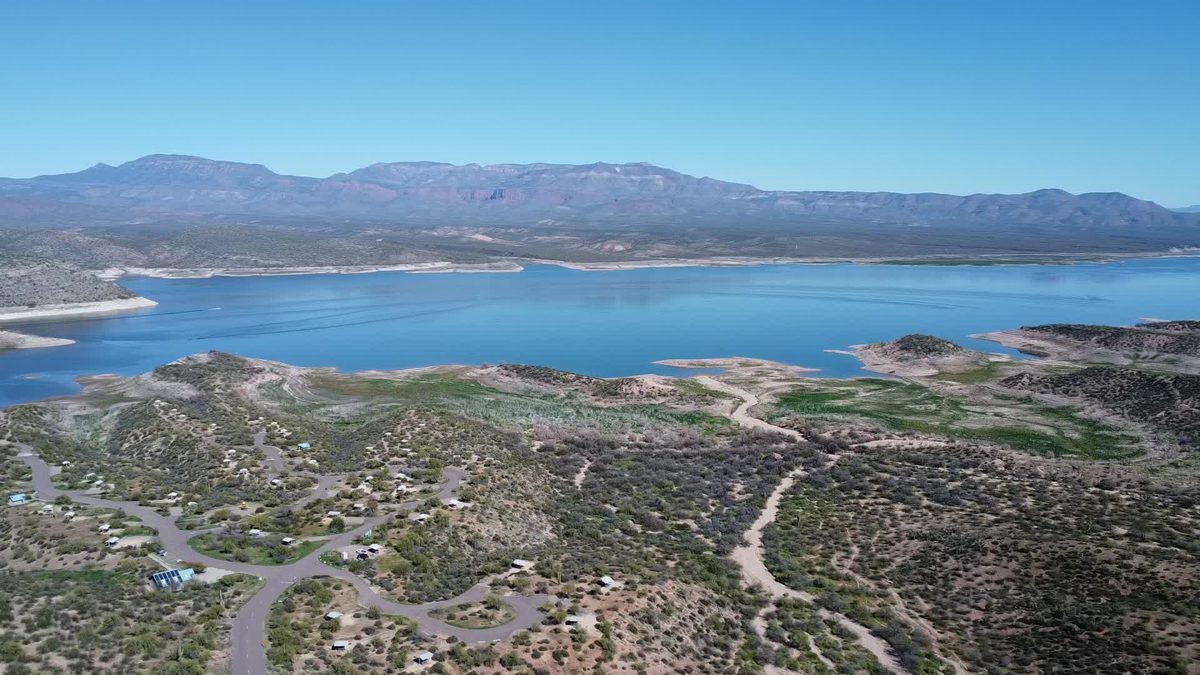 Desert lake and mountains aerial landscape