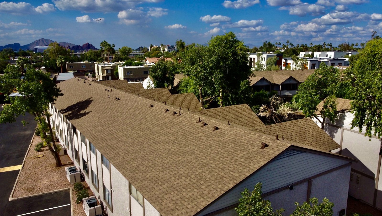 Oblique drone view of multifamily roof for condition survey